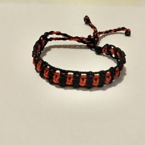 Bracelet, 25cm, black and red.